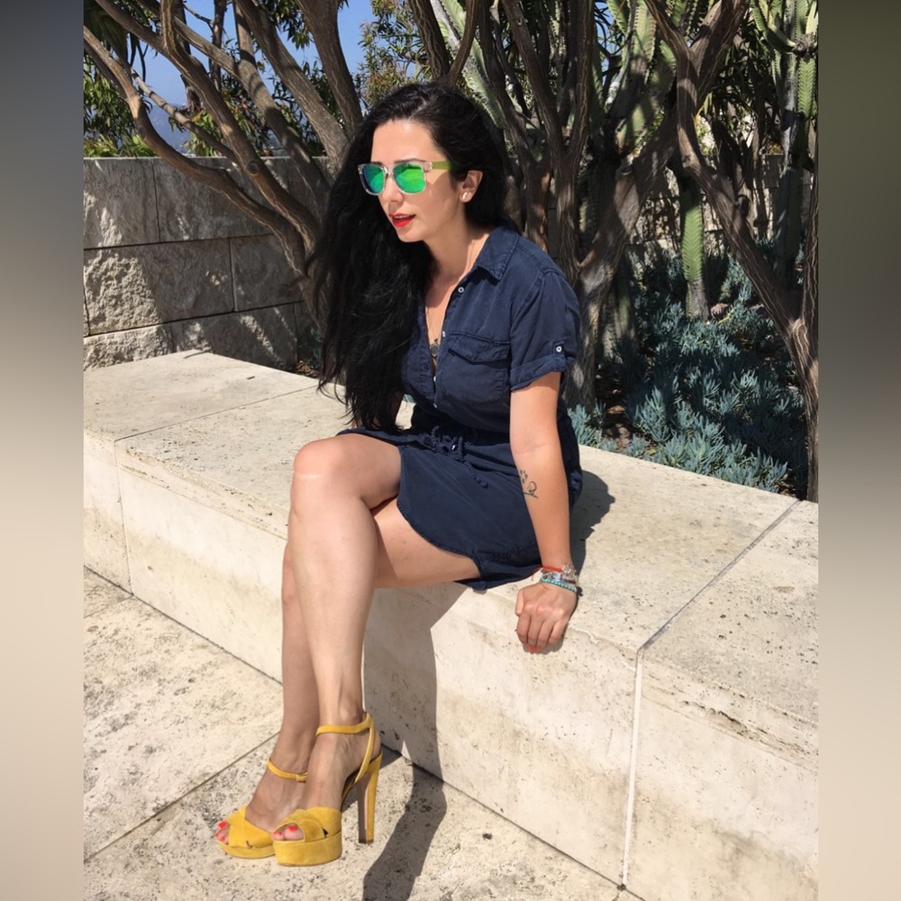 Yellow high heels sandals with platform.